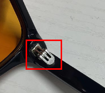 Spring-loaded hinges for sunglasses